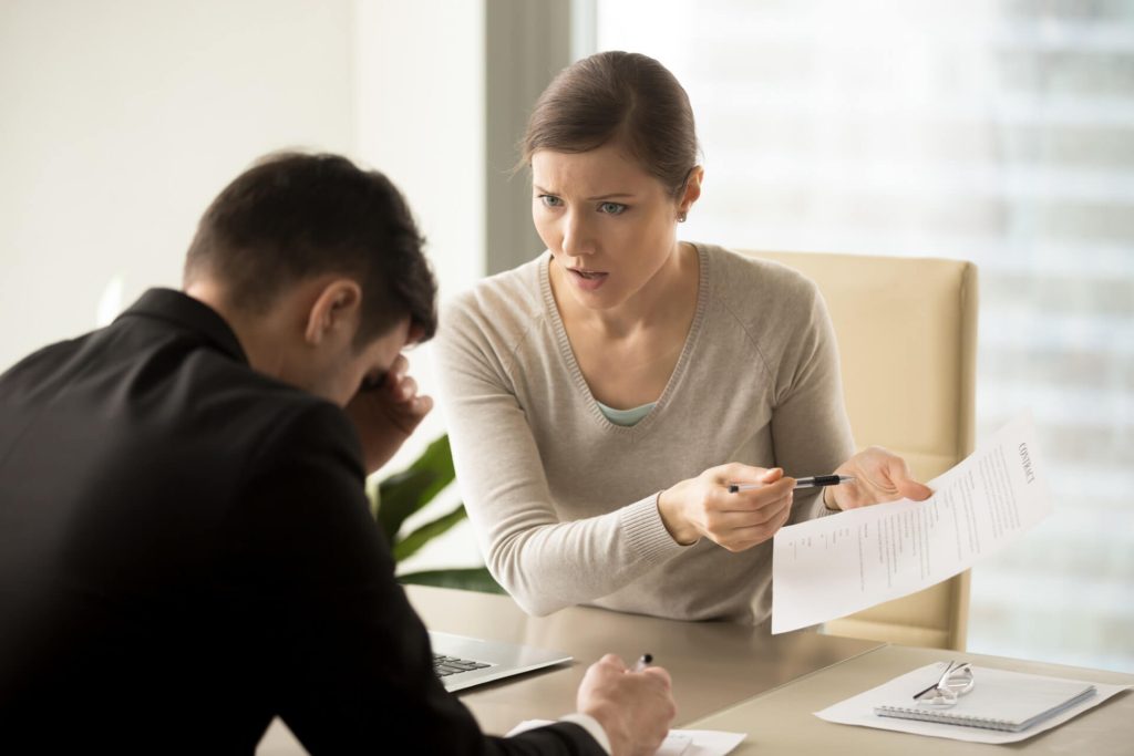 Nevada wrongful termination lawyer consulting employee in Las Vegas office
