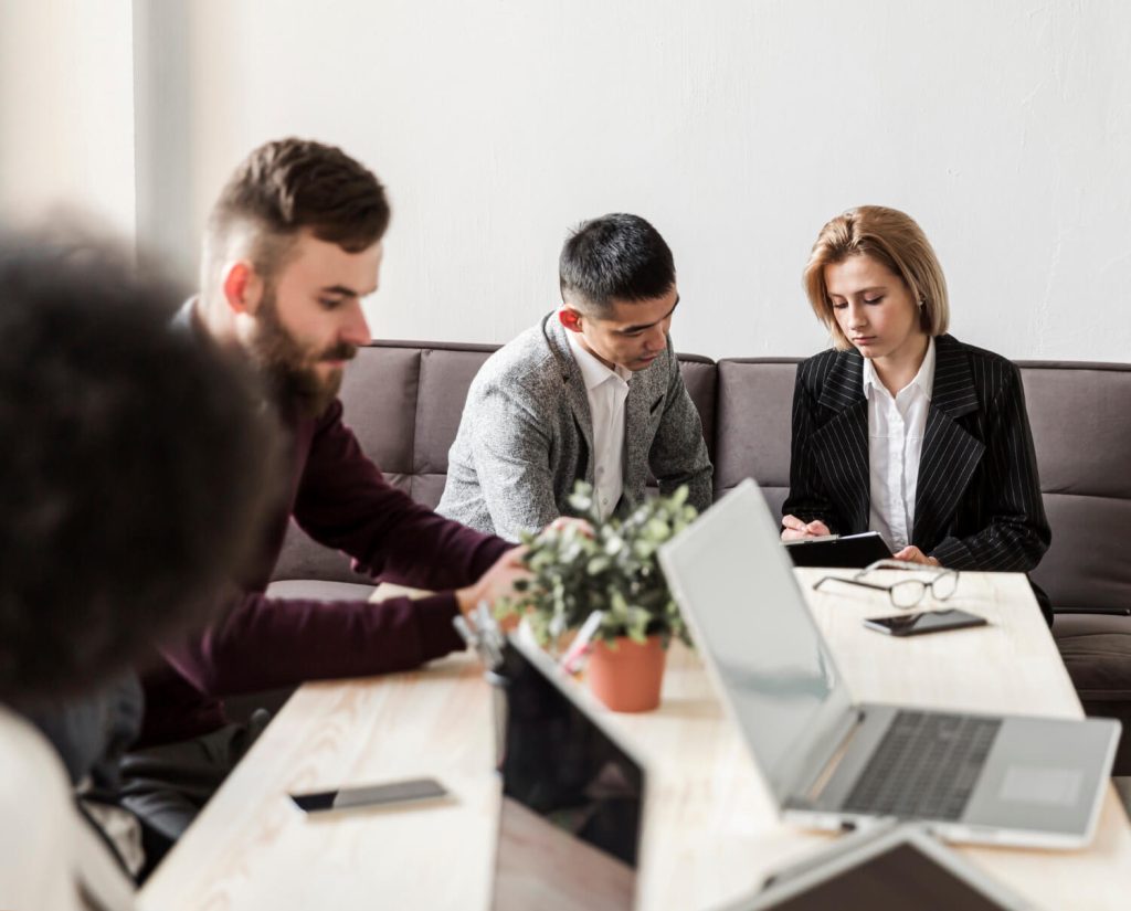 Employee consulting a Nevada employment attorney about employment lawsuit settlement options