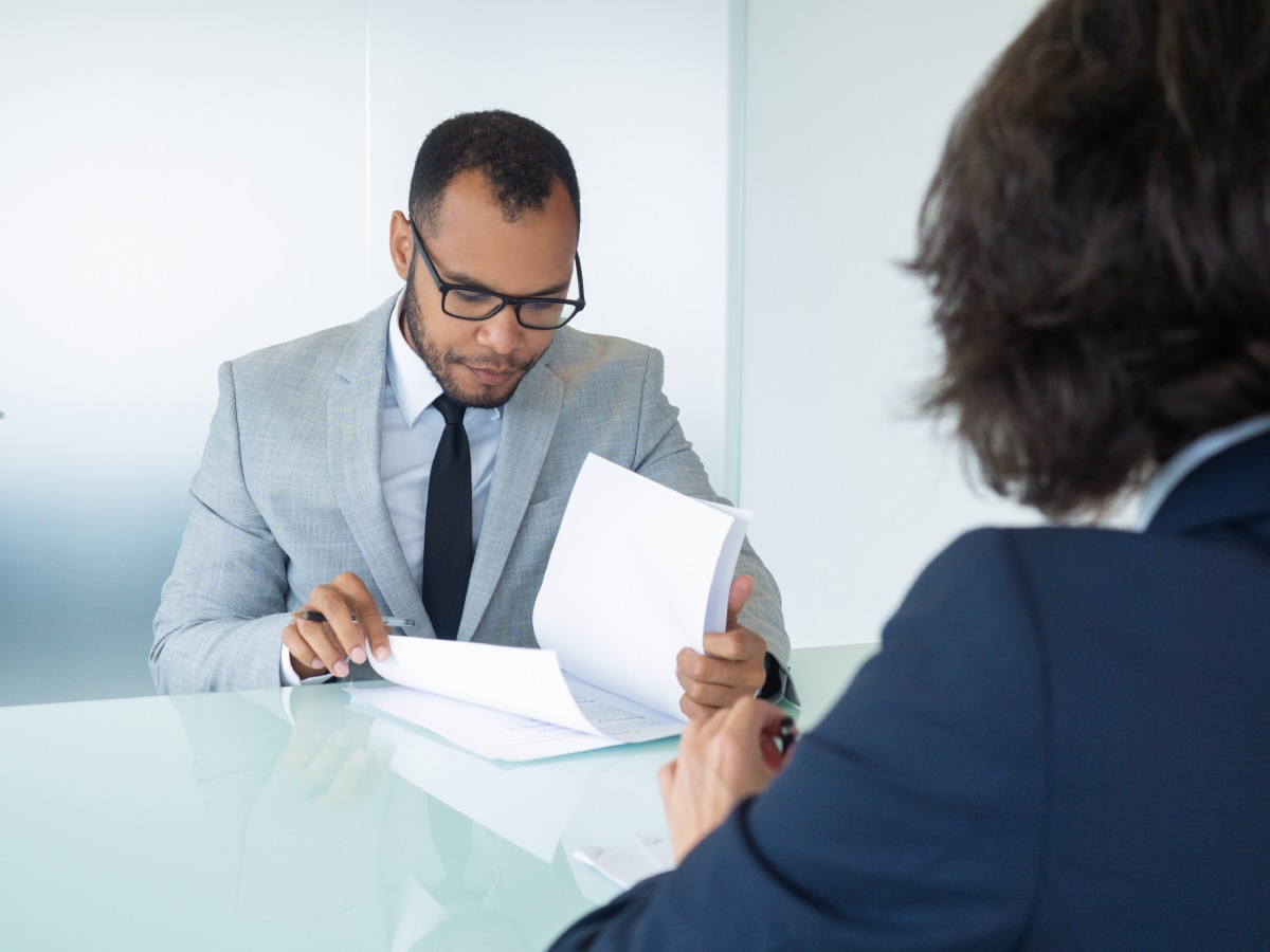 Employment attorney reviewing severance package and legal terms for Nevada employee
