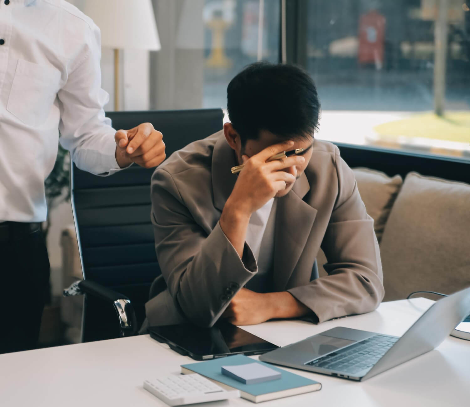 Employee meeting with a supervisor after receiving a workplace demotion in Nevada
