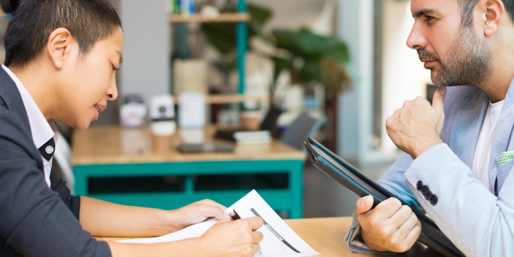 Nevada sales employee reviewing unpaid commission records with an employment attorney