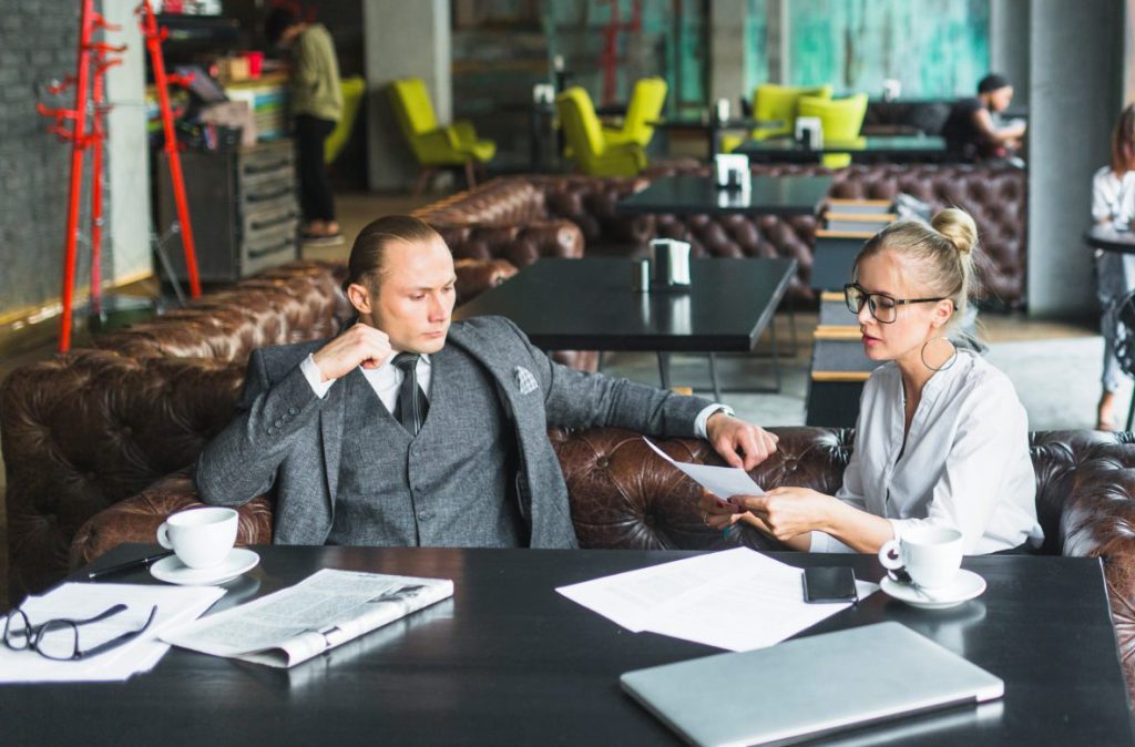 Restaurant server discussing stolen tips and Nevada wage laws with an employment lawyer