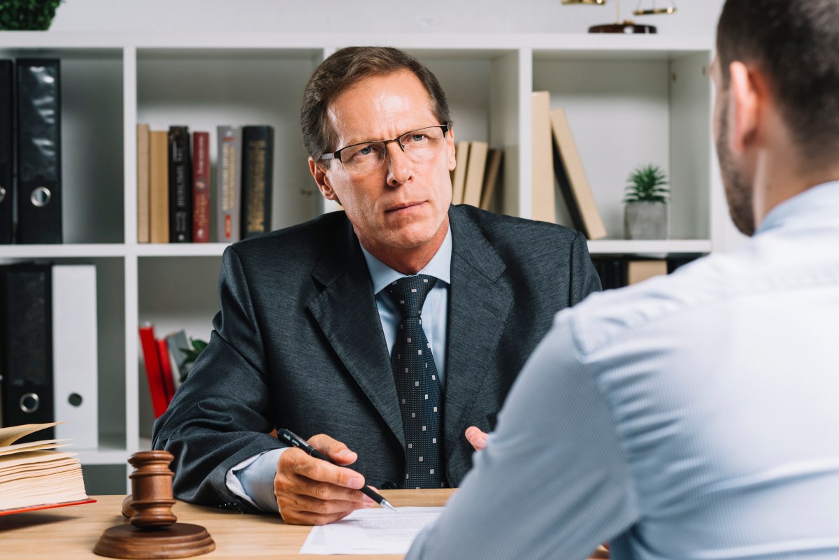 Employment lawyer explaining hostile work environment laws to a Nevada employee