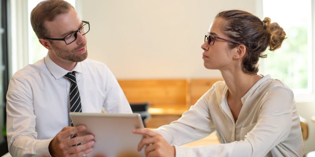 Employer discussing workplace drug testing and cannabis policies with an employee in Nevada