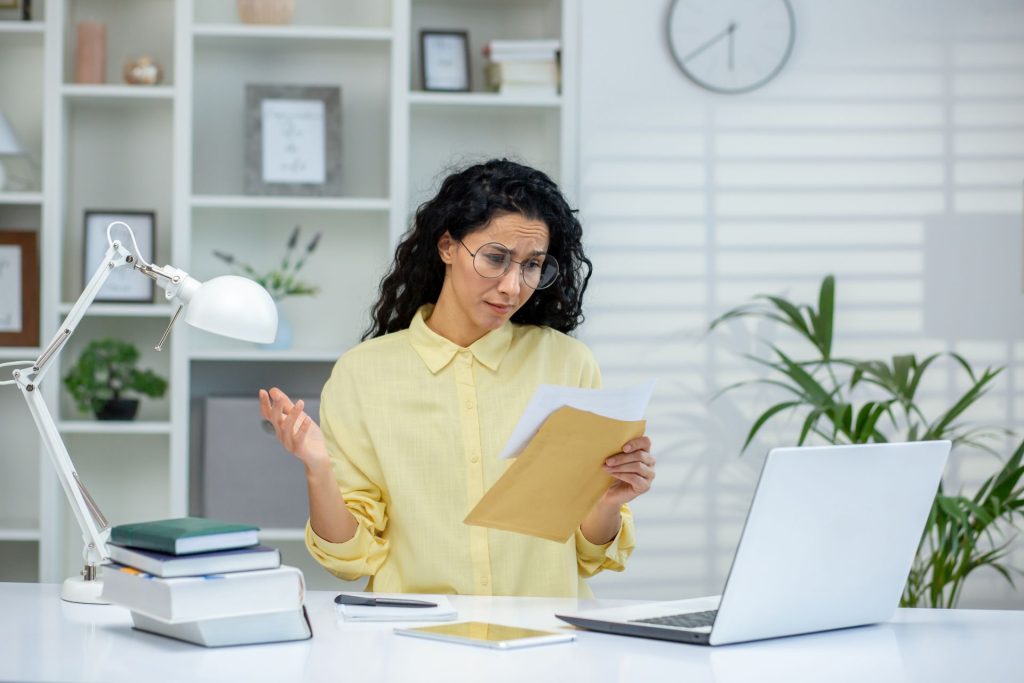 Employee reviewing workplace communications after retaliation concerns in Nevada