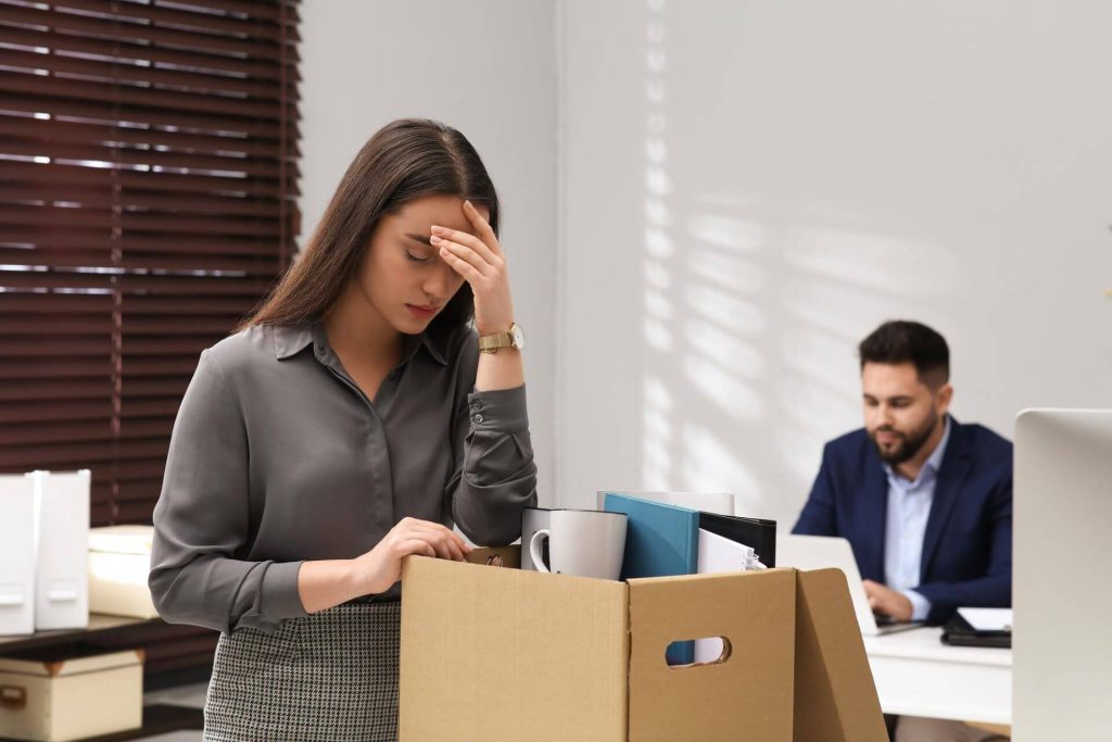fired-while-on-medical-leave-nevada Employee reviewing medical leave and termination documents in Nevada