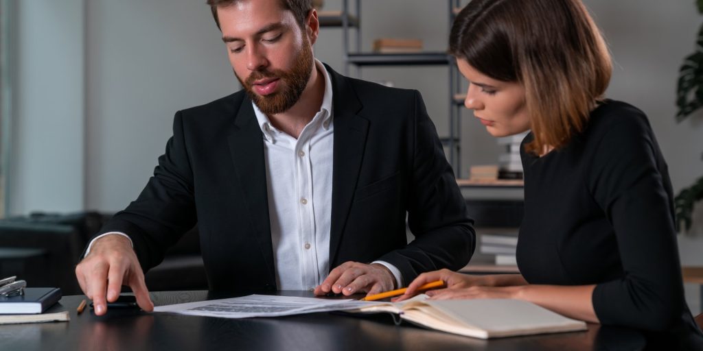 Nevada employee reviewing workplace drug testing policy with an employment attorney