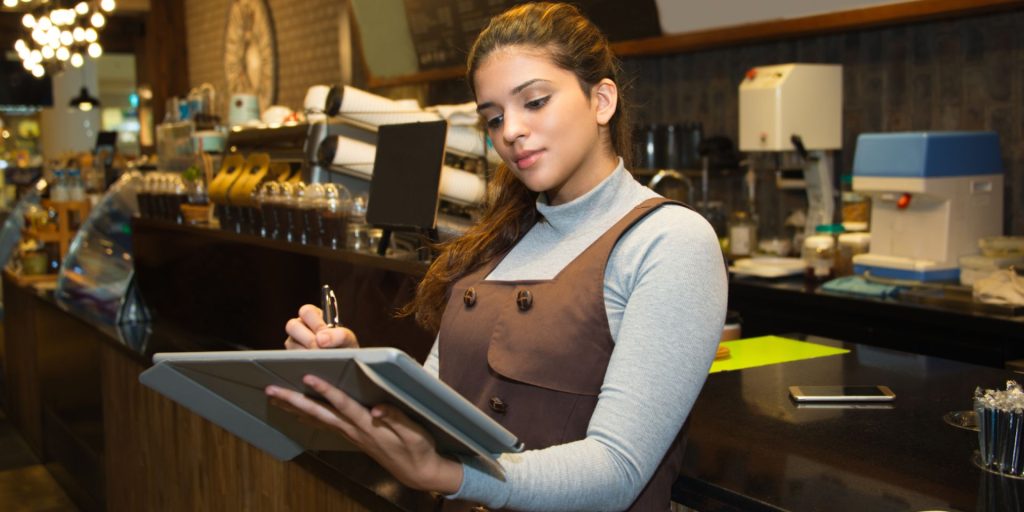 Nevada hospitality worker reviewing tip distribution records