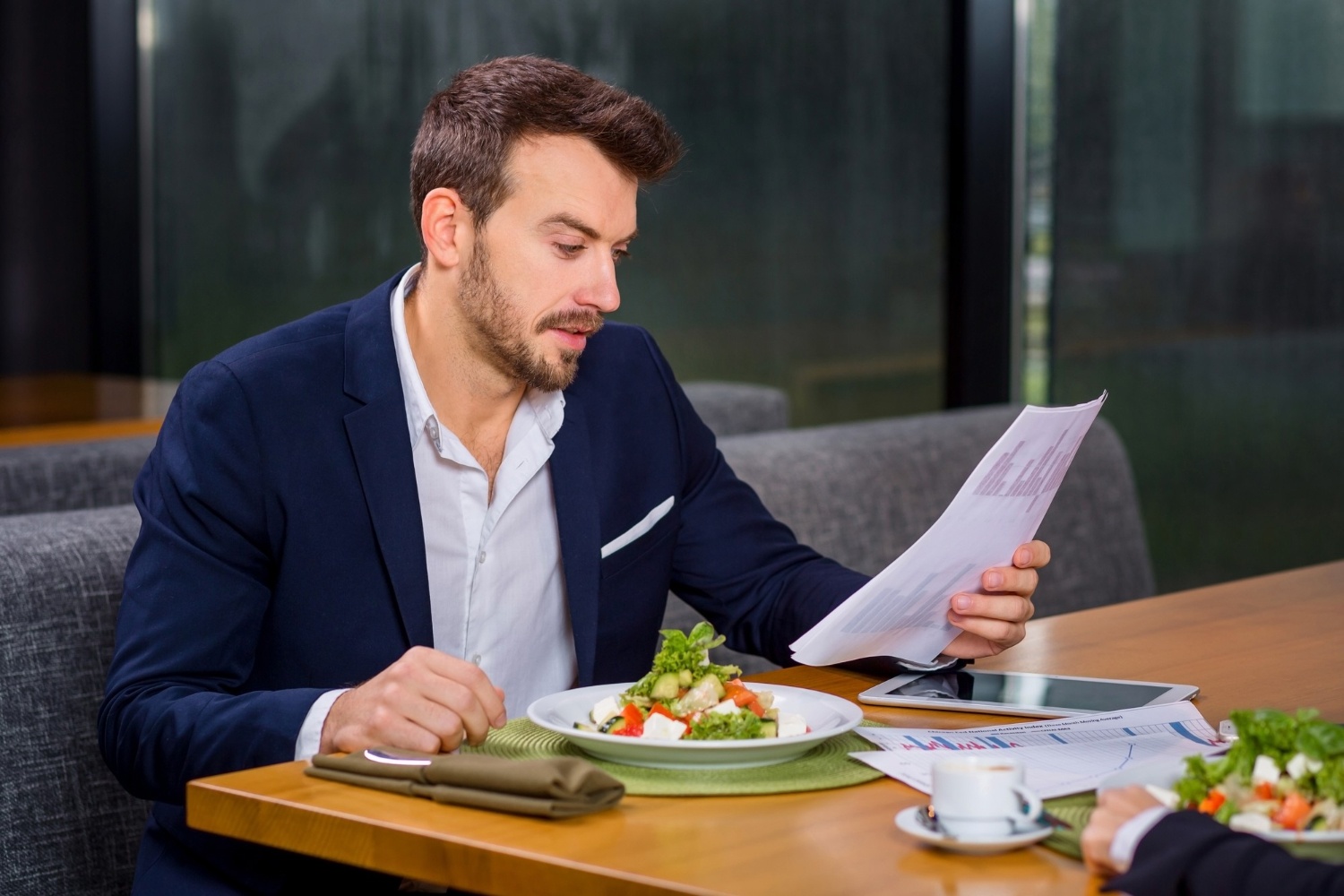 California employee reviewing work schedules and time records for meal break compliance and wage rights.