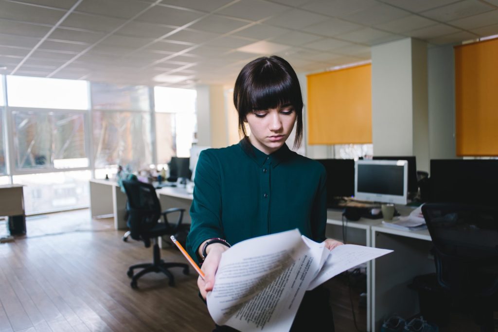 Employee documenting workplace sexual harassment incidents in Nevada