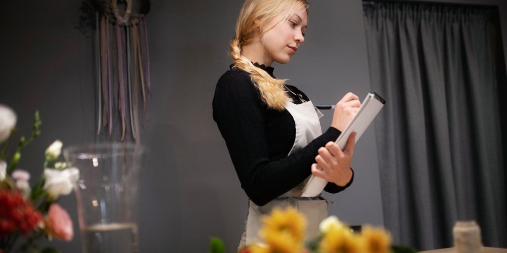 nevada-banquet-service-charge-vs-tip Las Vegas banquet worker reviewing service charge and tip payments