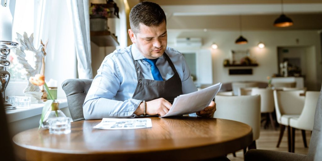Nevada hospitality worker reviewing an on-call and split-shift schedule