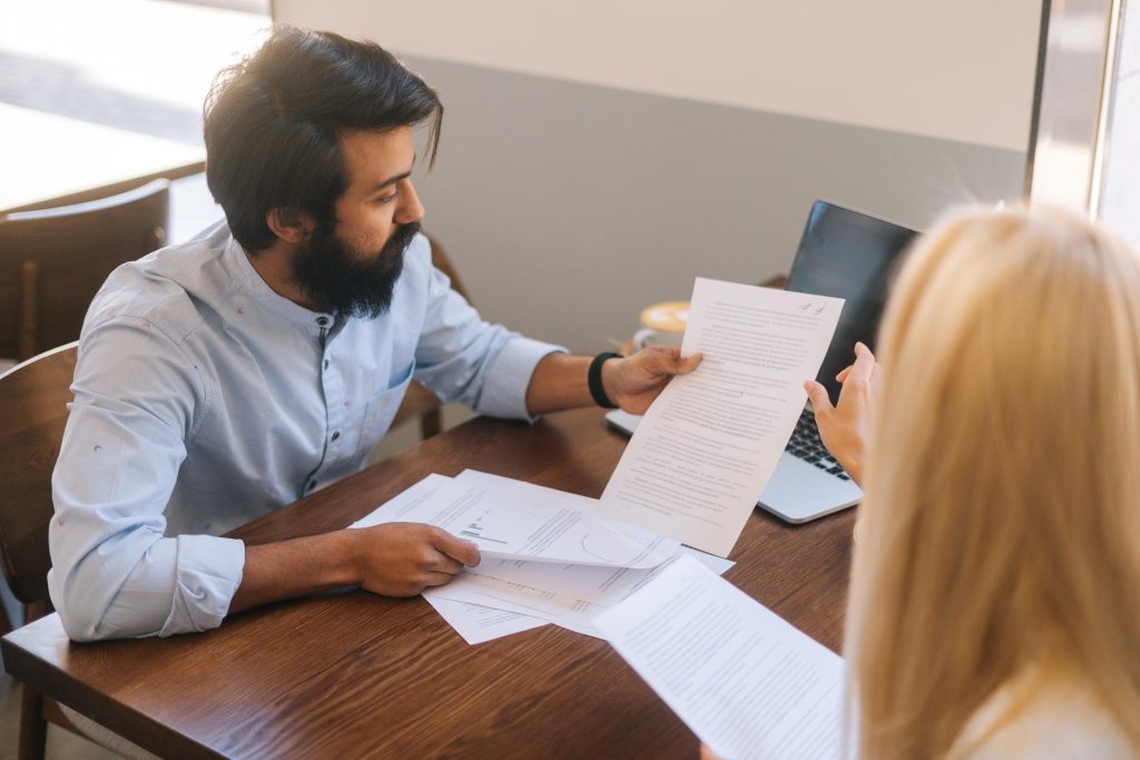 Employee reviewing severance payment period and unemployment benefit information in Nevada