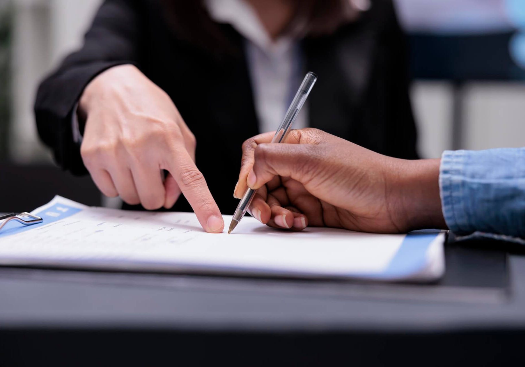Nevada employee reviewing an employment arbitration agreement with an employment attorney