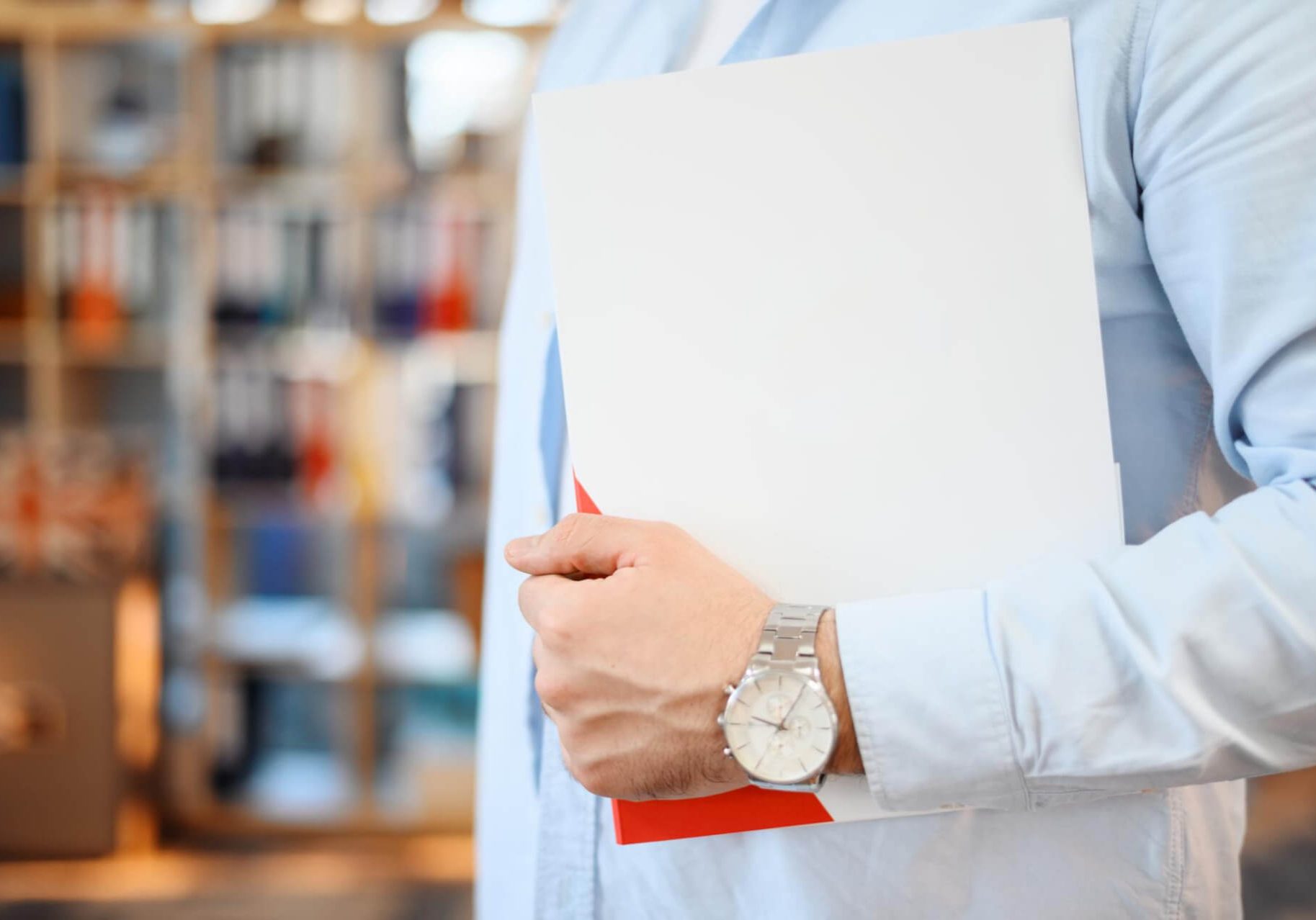 Nevada employee reviewing a workplace handbook with an employment attorney