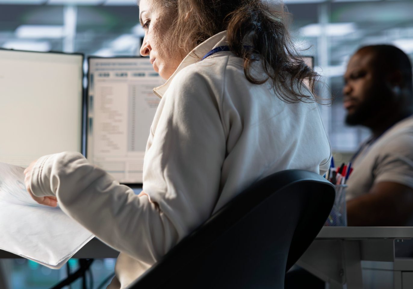 Employee reviewing evidence of workplace retaliation in Nevada