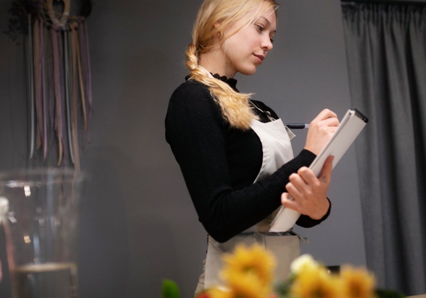 Las Vegas banquet worker reviewing service charge and tip payments