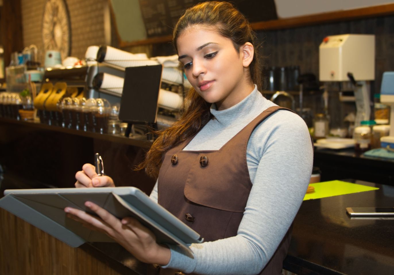 Nevada hospitality worker reviewing tip distribution records
