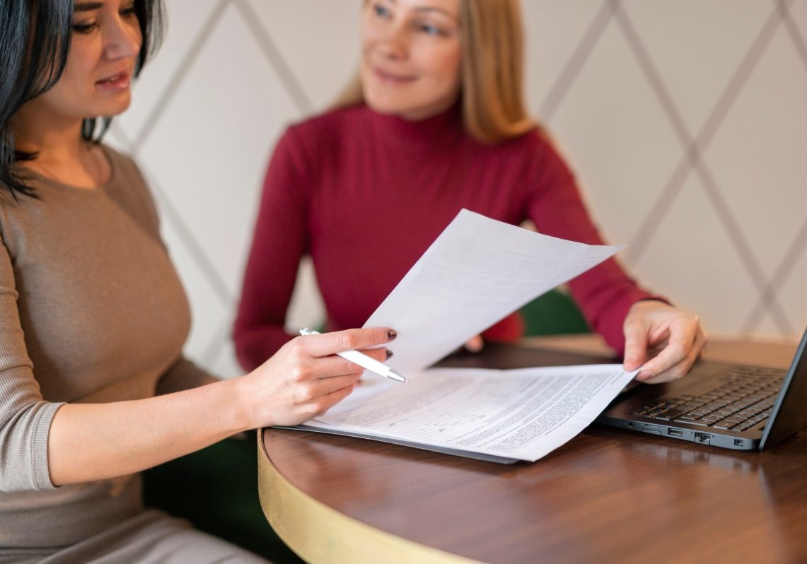Nevada employee reviewing severance agreement before signing employment separation documents