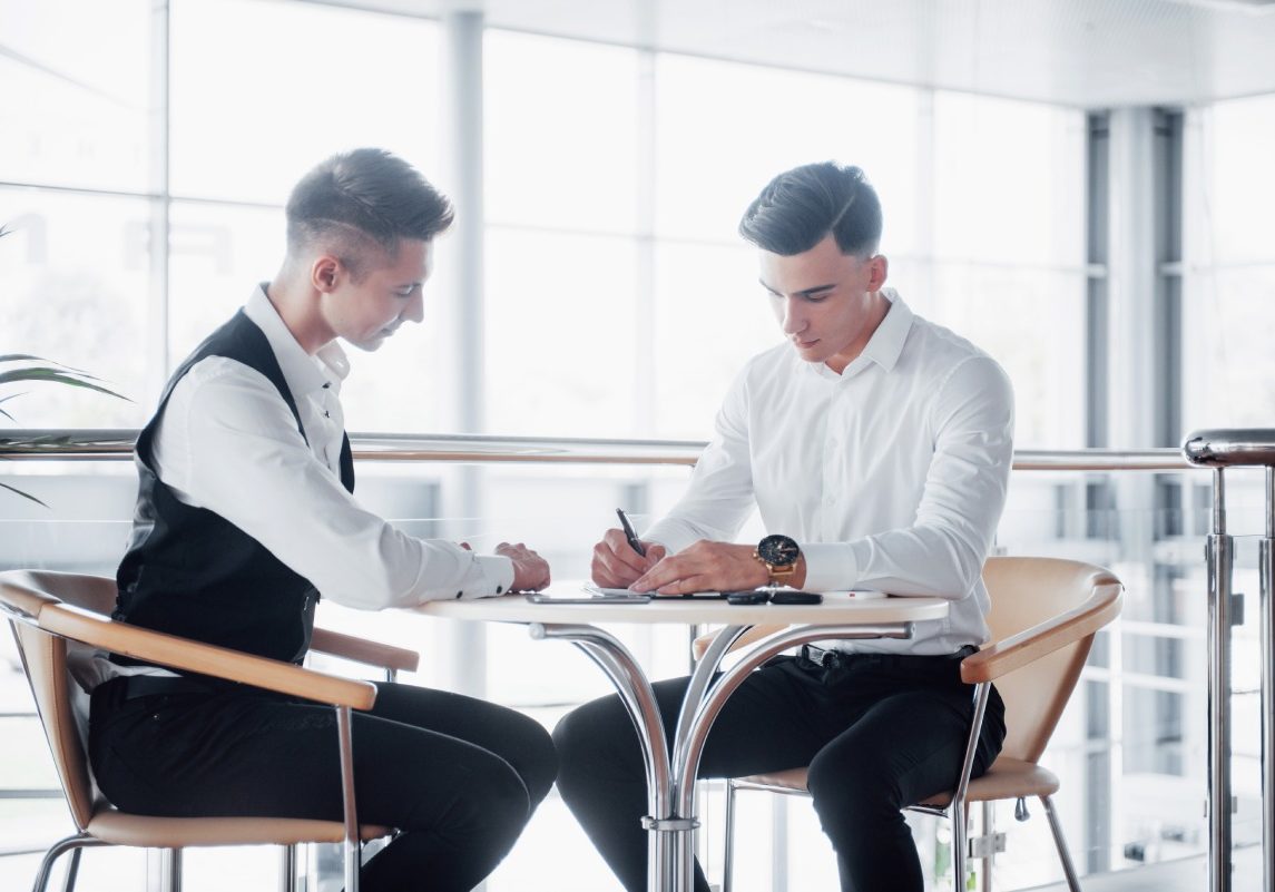 Las Vegas hospitality employee reviewing tip pooling and wage rights with an employment attorney