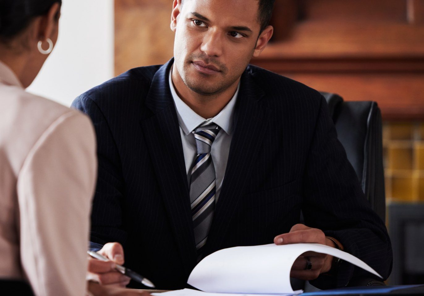College intern discussing unpaid internship rights with a Nevada employment attorney