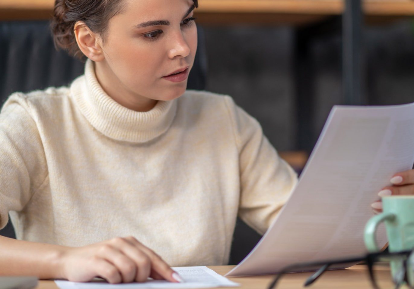 Nevada employee reviewing a paycheck and wage garnishment notice