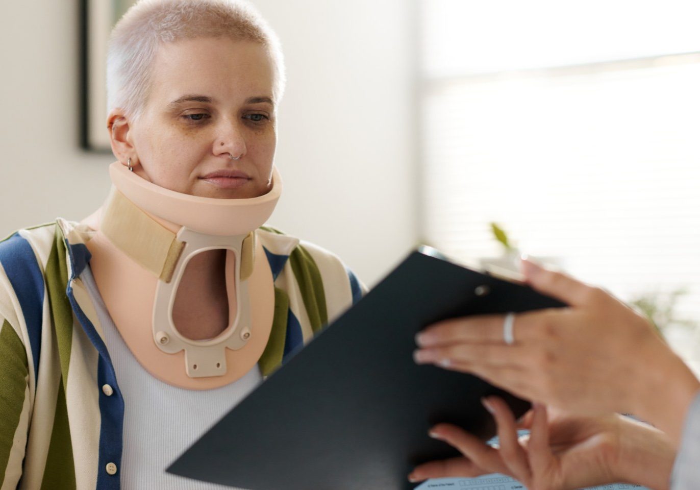 Nevada employee reviewing workers compensation documents after a workplace injury