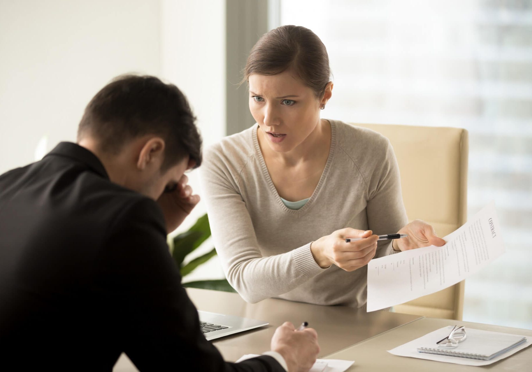 Nevada wrongful termination lawyer consulting employee in Las Vegas office